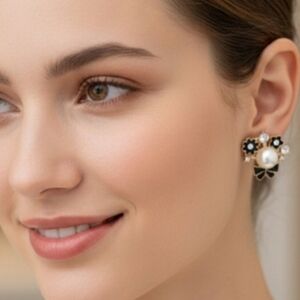 Black flower and white pearl stud earrings with a bow. 3 Cm